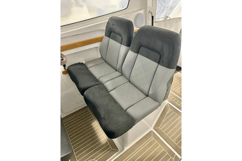 Slide: The Image of 2023 Nimbus Weekender 9 interior seating with modern, quilted upholstery design. - 8