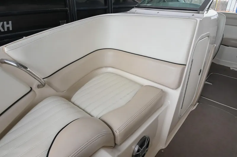 Slide: The Image of 2007 Bryant 270 boat interior with beige and white seating. - 5