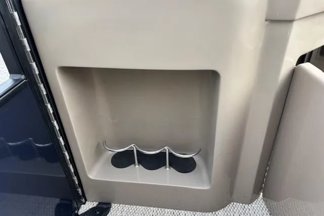 Slide: The Image of Cup holder compartment in 2025 Bennington 23 SXPD boat interior. - 17