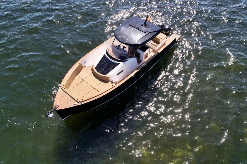 Slide: The Image of 2023 Tesoro T38 luxury yacht cruising on sparkling water. - 19