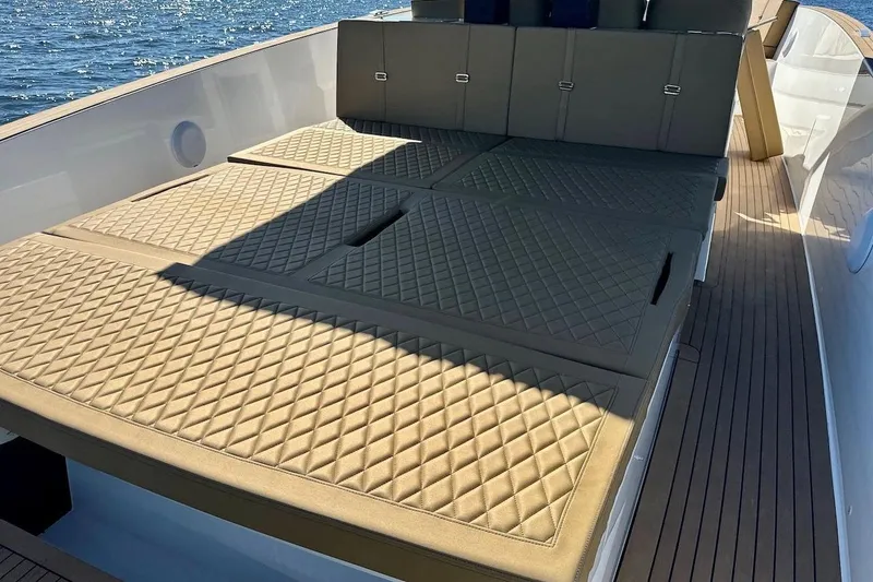 Slide: The Image of Luxurious 2023 Tesoro T38 yacht with quilted sunbed on deck, ocean view. - 26