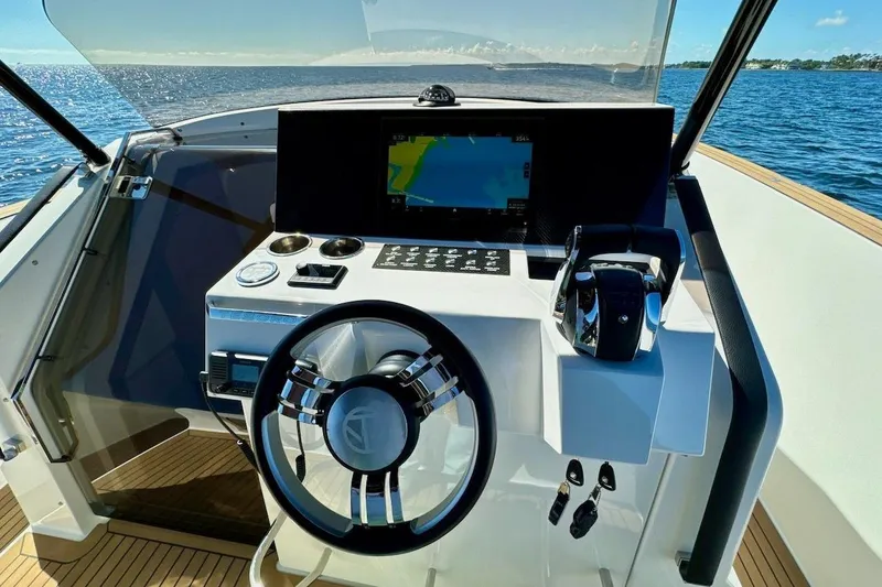 Slide: The Image of Cockpit of 2023 Tesoro T38 yacht with modern steering and navigation system. - 34