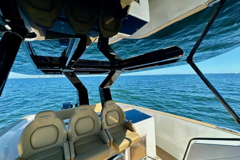Slide: The Image of Luxury Tesoro T38 yacht interior with ocean view, 2023 model. - 38