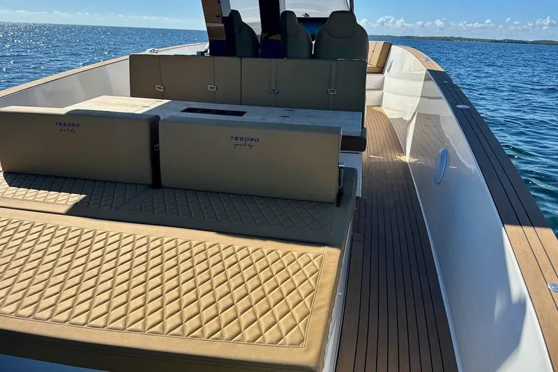 Slide: The Image of 2023 Tesoro T38 yacht with luxurious seating on open water. - 45