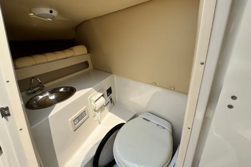 Slide: The Image of 2013 Chris-Craft Launch 28 boat interior with sink and toilet. - 22