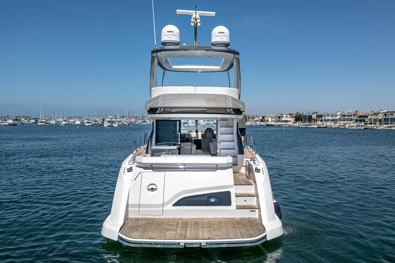 Slide: The Image of 2024 Azimut Fly 53 yacht on water, rear view, sunny day. - 9