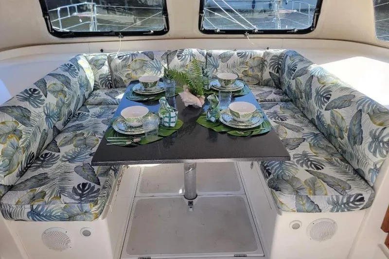 Slide: The Image of 2008 Seawind 1000 XL catamaran deck with netting and rigging details. - 2