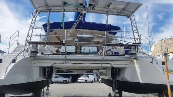 Slide: The Image of 2008 Seawind 1000 XL catamaran docked at harbor. - 27