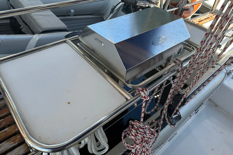 Slide: The Image of Seawind 1000 XL 2008 yacht deck with stainless steel grill and ropes. - 49