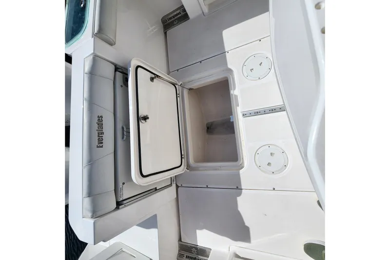 Slide: The Image of 2017 Everglades 255 Center Console boat interior with open storage compartment. - 25