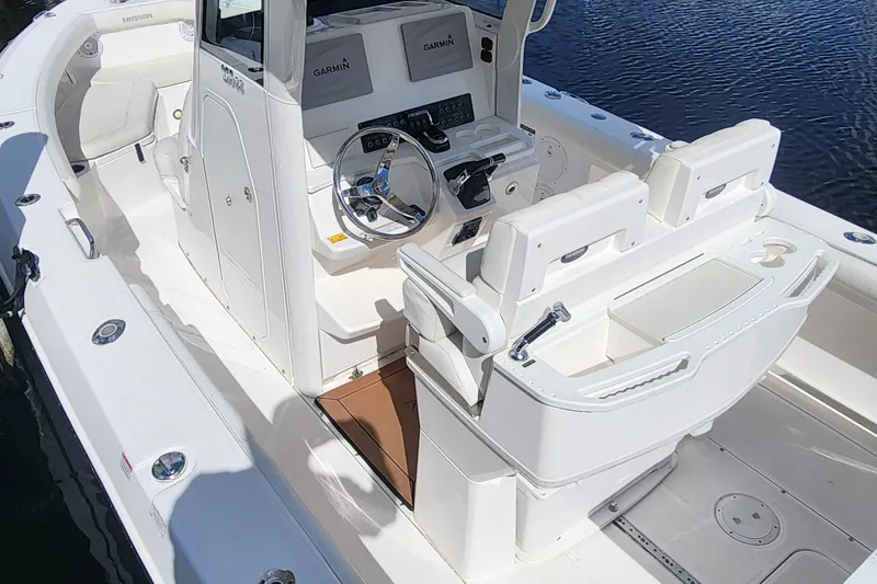 Slide: The Image of 2017 Everglades 255 Center Console boat interior with steering wheel and seating. - 32
