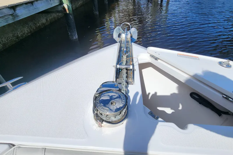 Slide: The Image of 2017 Everglades 255 Center Console boat anchor system by the water. - 35