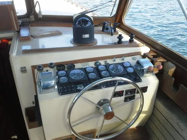 Slide: The Image of Fortier Sportfish Cruiser repower 2003 1988 - 1