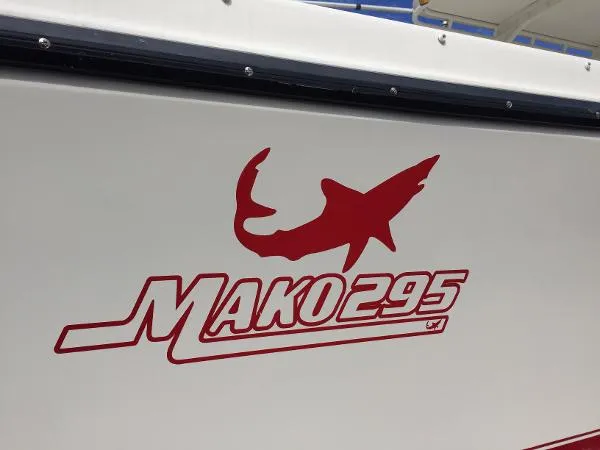 Slide: The Image of Mako 295 Side Console Cuddy 1997 - 1