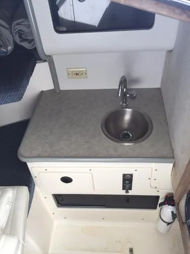 Slide: The Image of Mako 295 Side Console Cuddy 1997 - 11