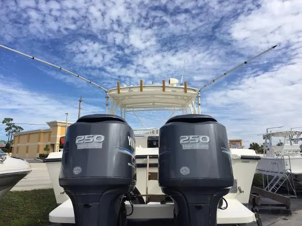 Slide: The Image of Mako 295 Side Console Cuddy 1997 - 2
