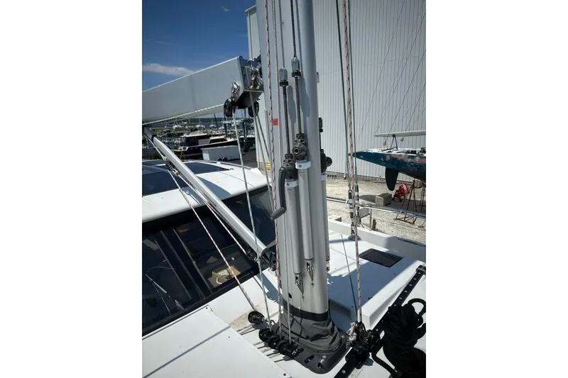 Slide: The Image of 2019 Moody 54 DS sailboat mast and rigging in marina setting. - 14