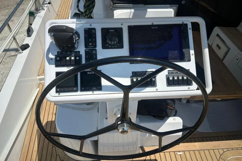 Slide: The Image of Steering wheel and control panel of 2019 Moody 54 DS yacht. - 19