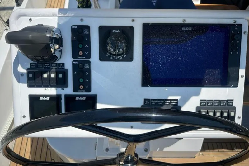 Slide: The Image of Cockpit controls of 2019 Moody 54 DS yacht with navigation instruments. - 20