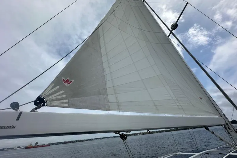 Slide: The Image of Sailing yacht Moody 54 DS 2019 with sails unfurled on a cloudy day. - 24