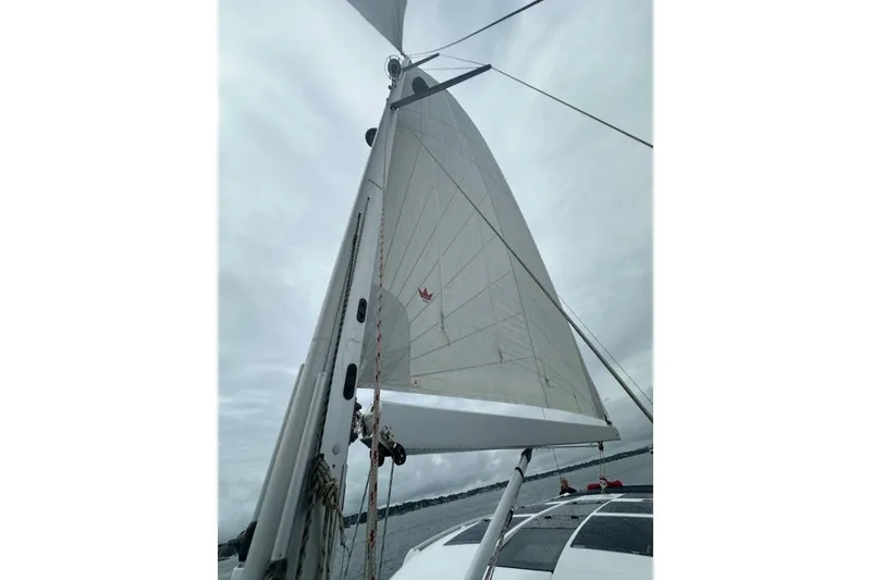 Slide: The Image of Sailing yacht Moody 54 DS 2019 with sails unfurled against cloudy sky. - 26