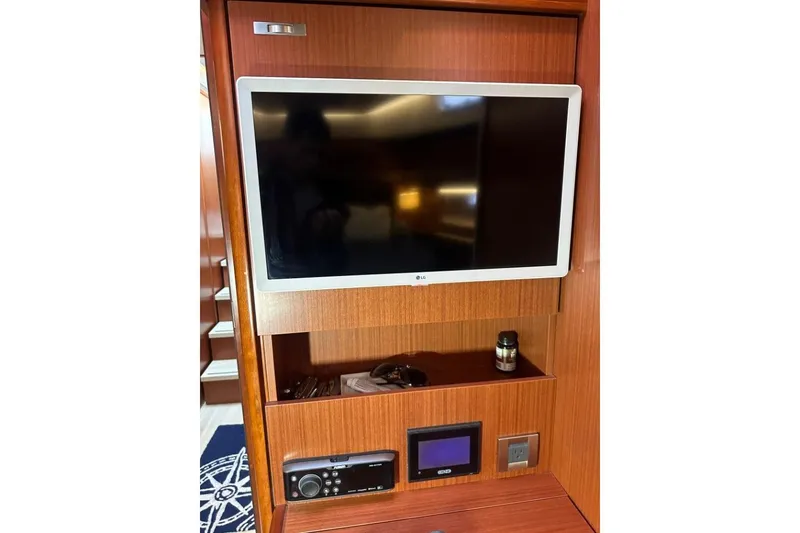 Slide: The Image of Entertainment system in 2019 Moody 54 DS yacht with TV and control panel. - 30