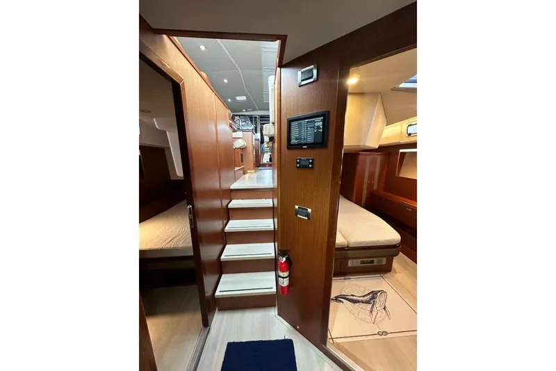 Slide: The Image of Interior of 2019 Moody 54 DS yacht with wooden finishes and modern design. - 37