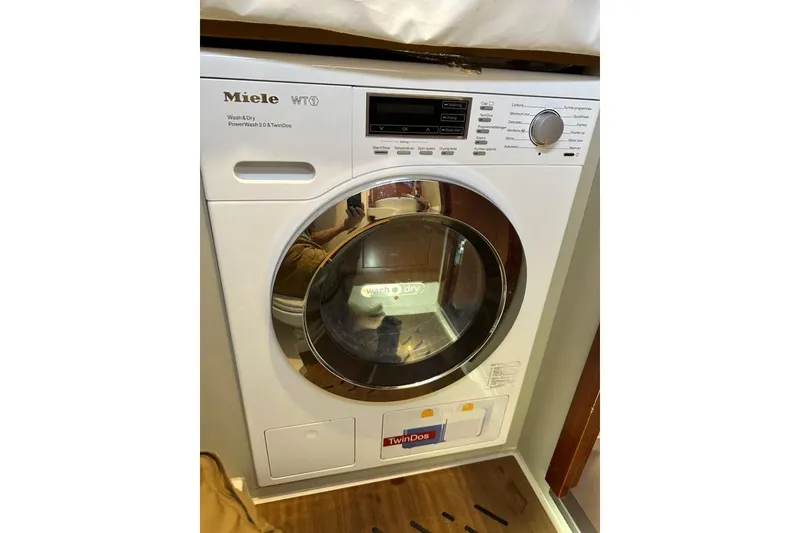 Slide: The Image of Miele WT1 washer-dryer in Moody 54 DS yacht, 2019 model, featuring TwinDos technology. - 52