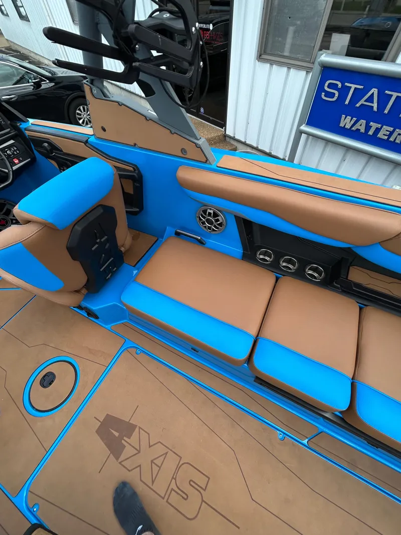 Slide: The Image of Interior of Axis T250 boat, blue and brown upholstery, 2023 model. - 21