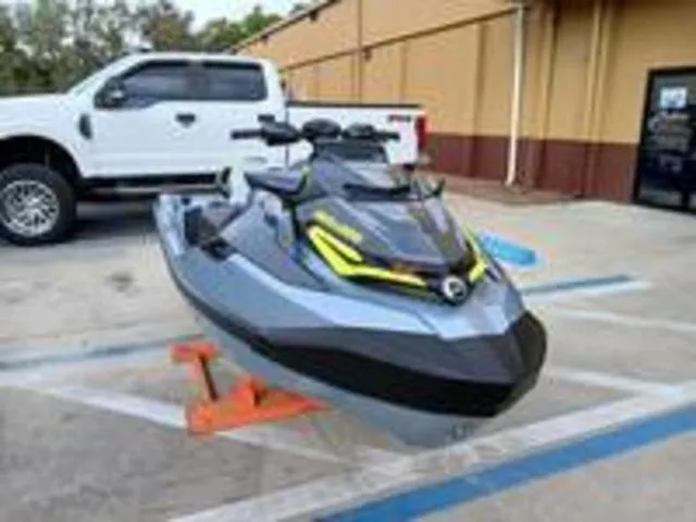 Slide: The Image of 2026 Sea-Doo RXT-X jet ski in front of a white truck. - 3