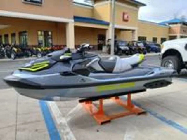 Slide: The Image of 2026 Sea-Doo RXT-X jet ski displayed outside a store. - 7