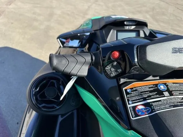 Slide: The Image of Close-up of 2026 Sea-Doo GTI SE 130 handlebar and controls. - 9