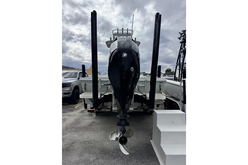 Slide: The Image of 2021 Pair Customs 24 Center Console MV boat with powerful outboard motor. - 5