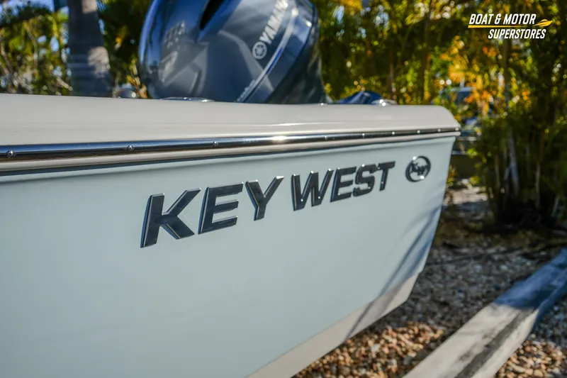 Slide: The Image of 2026 Key West 188 Bay Reef boat with Yamaha engine, outdoor display. - 13