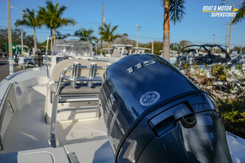 Slide: The Image of 2026 Key West 188 Bay Reef boat with Yamaha 115 engine, displayed at dealership. - 17