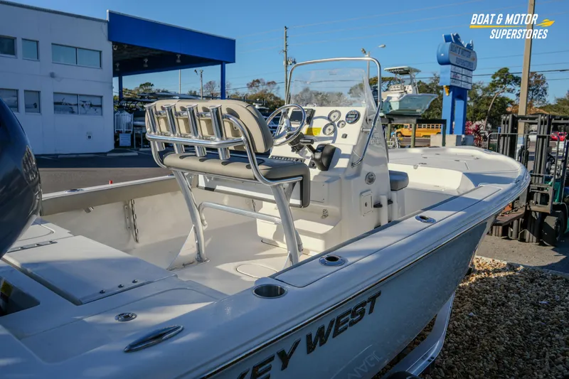 Slide: The Image of 2026 Key West 188 Bay Reef boat at dealership, showcasing interior and console. - 22