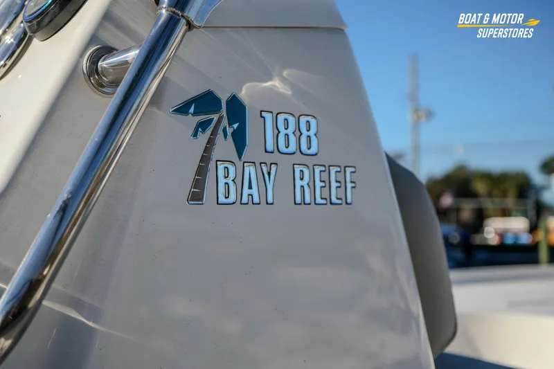 Slide: The Image of Close-up of 2026 Key West 188 Bay Reef boat logo in sunlight. - 25