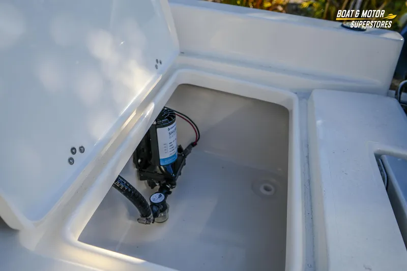 Slide: The Image of Open storage compartment in 2026 Key West 188 Bay Reef boat. - 28