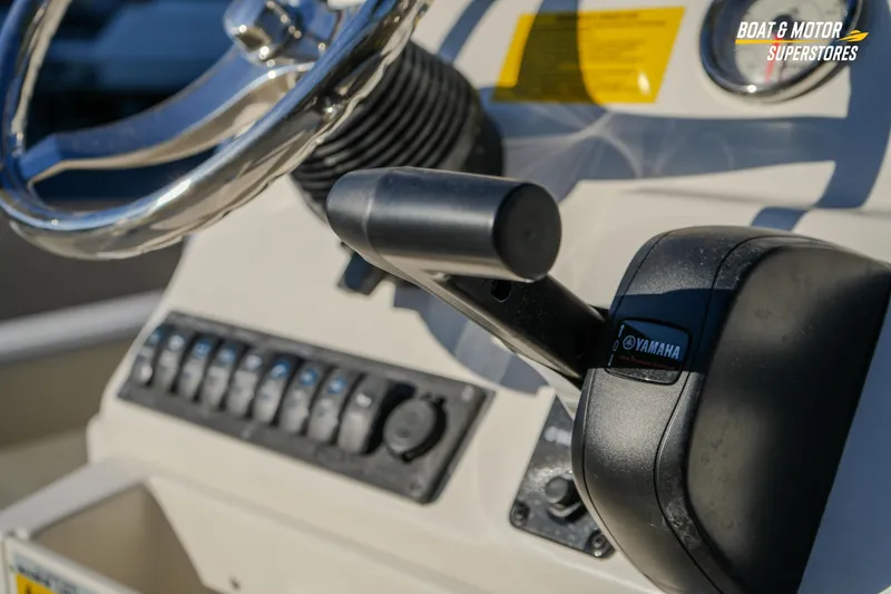 Slide: The Image of Close-up of 2026 Key West 188 Bay Reef boat controls and steering wheel. - 29