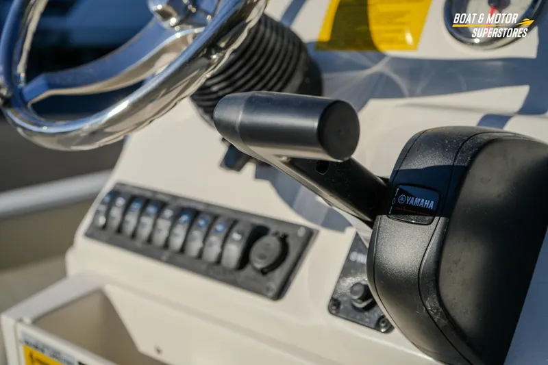 Slide: The Image of 2026 Key West 188 Bay Reef boat console with Yamaha controls and steering wheel. - 30