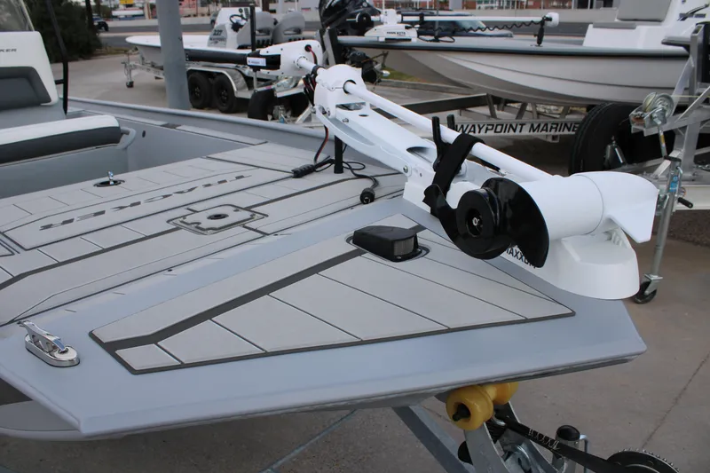 Slide: The Image of 2026 Tracker Bass Tracker Classic CC boat with trolling motor on trailer. - 14