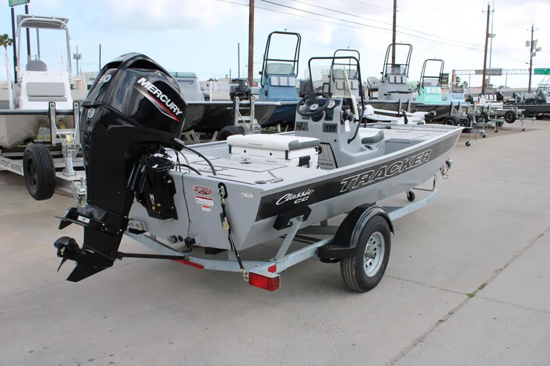 Slide: The Image of 2026 Tracker Bass Tracker Classic CC boat with Mercury engine on trailer. - 6
