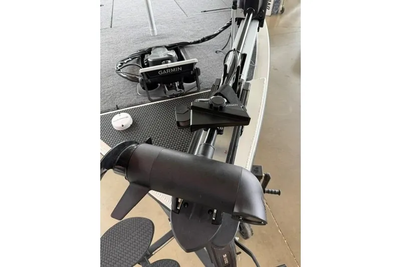 Slide: The Image of 2026 Tracker Savage 215 boat with Garmin equipment on deck. - 12