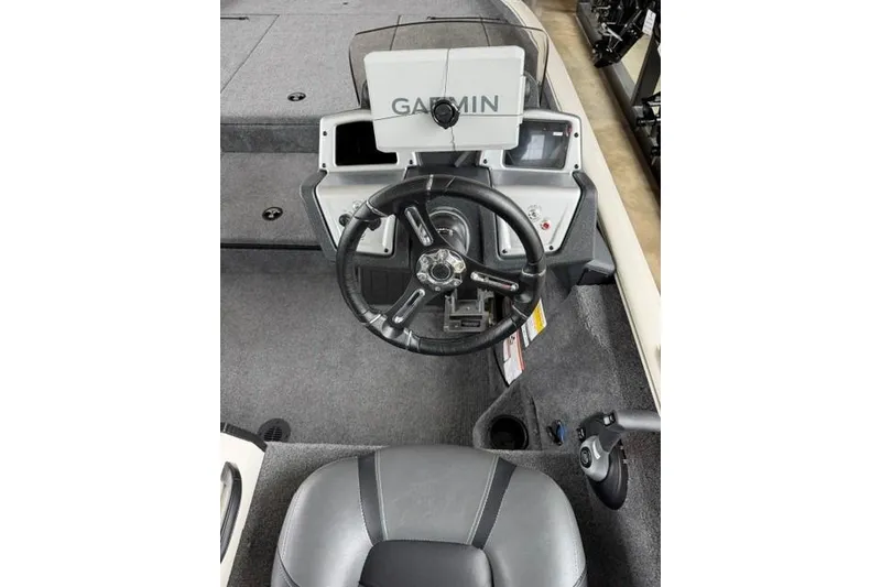 Slide: The Image of Steering console of 2026 Tracker Savage 215 boat with Garmin navigation system. - 9