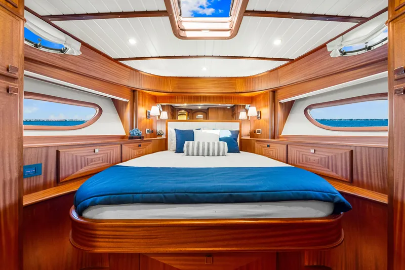 Slide: The Image of Luxurious 2026 Vicem 55 Classic yacht cabin with elegant wood finish and ocean view. - 10