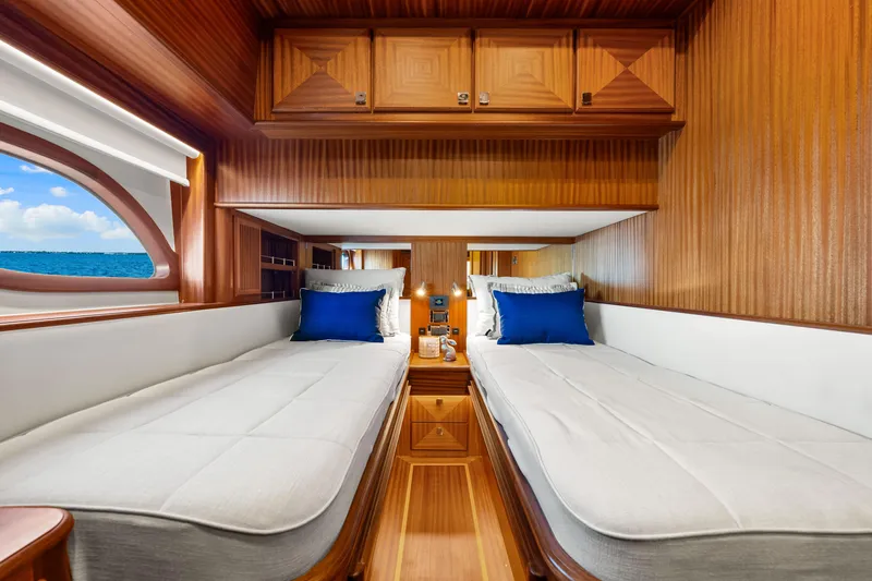 Slide: The Image of Luxurious twin cabin interior of 2026 Vicem 55 Classic yacht with ocean view. - 13