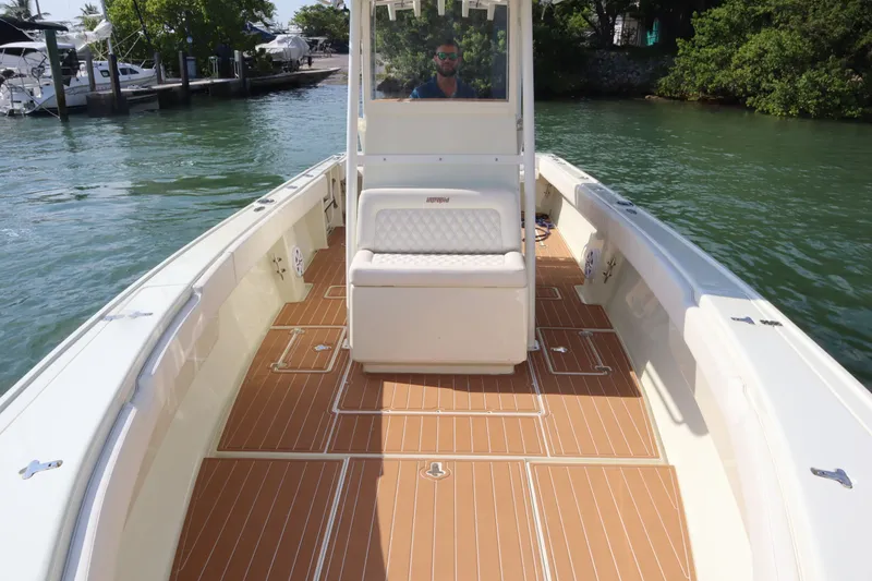 Slide: The Image of Intrepid 289 Open boat from 2002 on calm waters. - 12