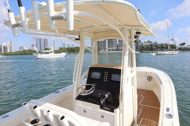 Slide: The Image of Intrepid 289 Open boat from 2002 on calm waters. - 16