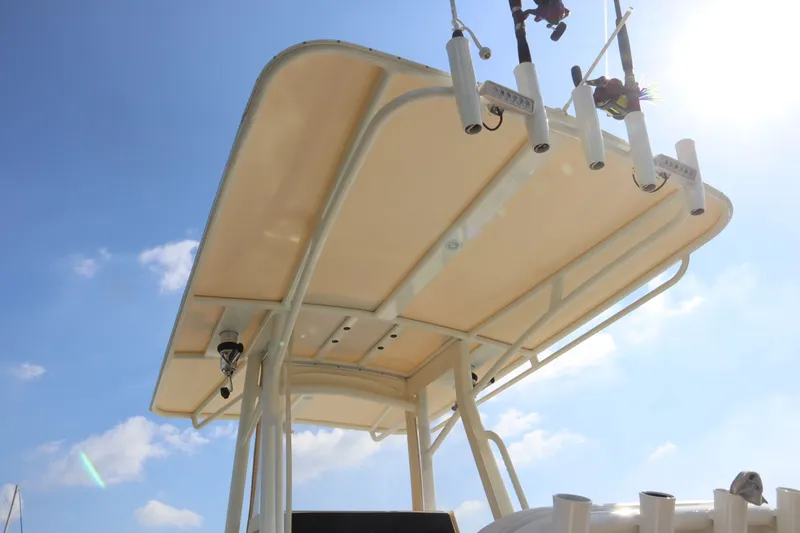 Slide: The Image of Intrepid 289 Open 2002 boat roof with fishing rod holders. - 17