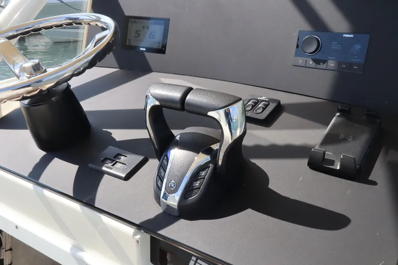 Slide: The Image of Control console of a 2002 Intrepid 289 Open boat. - 24